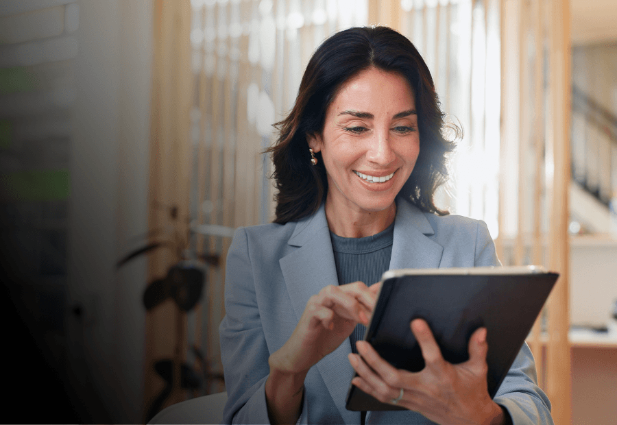 Hospitality executive using Typsy on a tablet to manage workforce capability across hotel operations