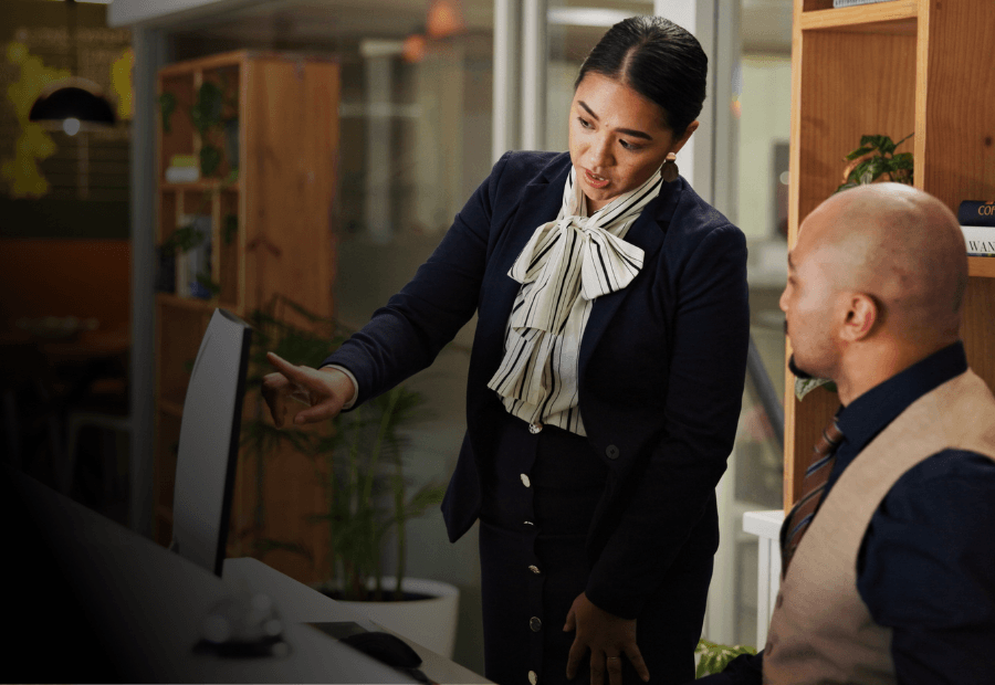 Hotel operations manager reviewing live workforce performance and operational insights across multiple properties