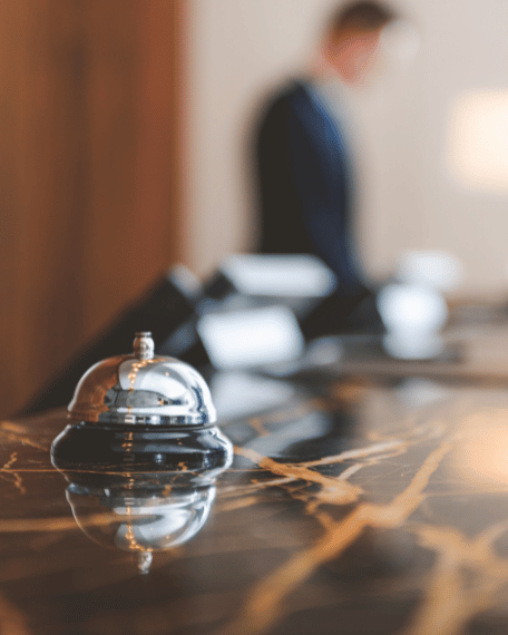 Hotel reception desk representing hotel operations and guest service excellence