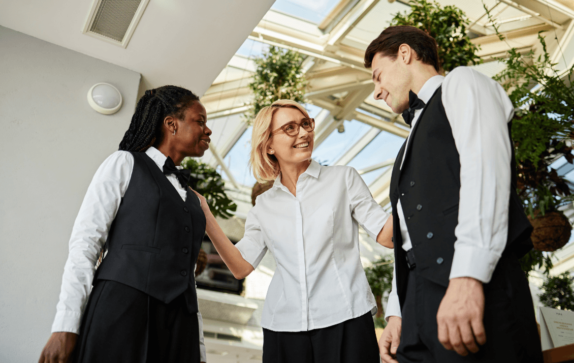 HR leader welcoming new hospitality employees during onboarding at a hotel
