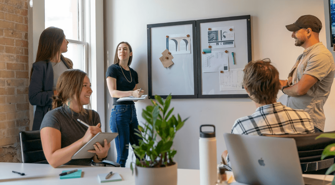Typsy team collaborating during an office planning meeting